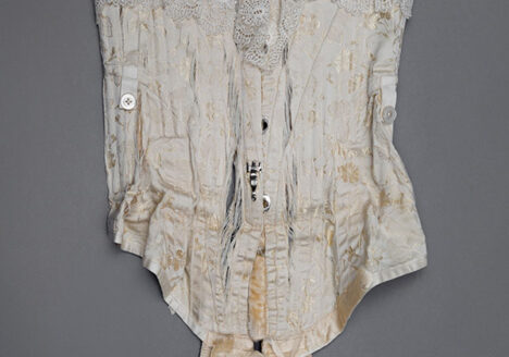 Silk & lace padded mid-bust corset with suspenders Photography by Tigz Rice Studios The Underpinnings Museum