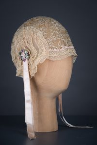 Lace ruffle boudoir cap, c.1920s, USA. The Underpinnings Museum. Photography by Tigz Rice
