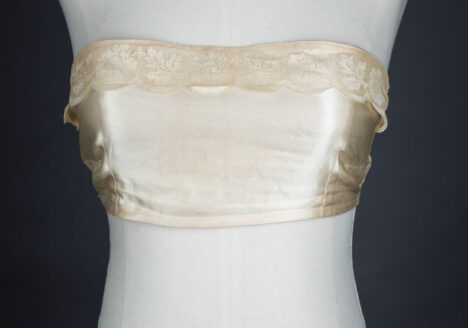 Satin bandeau bra with tripartate strapping by The Modishform, c. late 1910s The Underpinnings Museum shot by Tigz Rice Studios 2017
