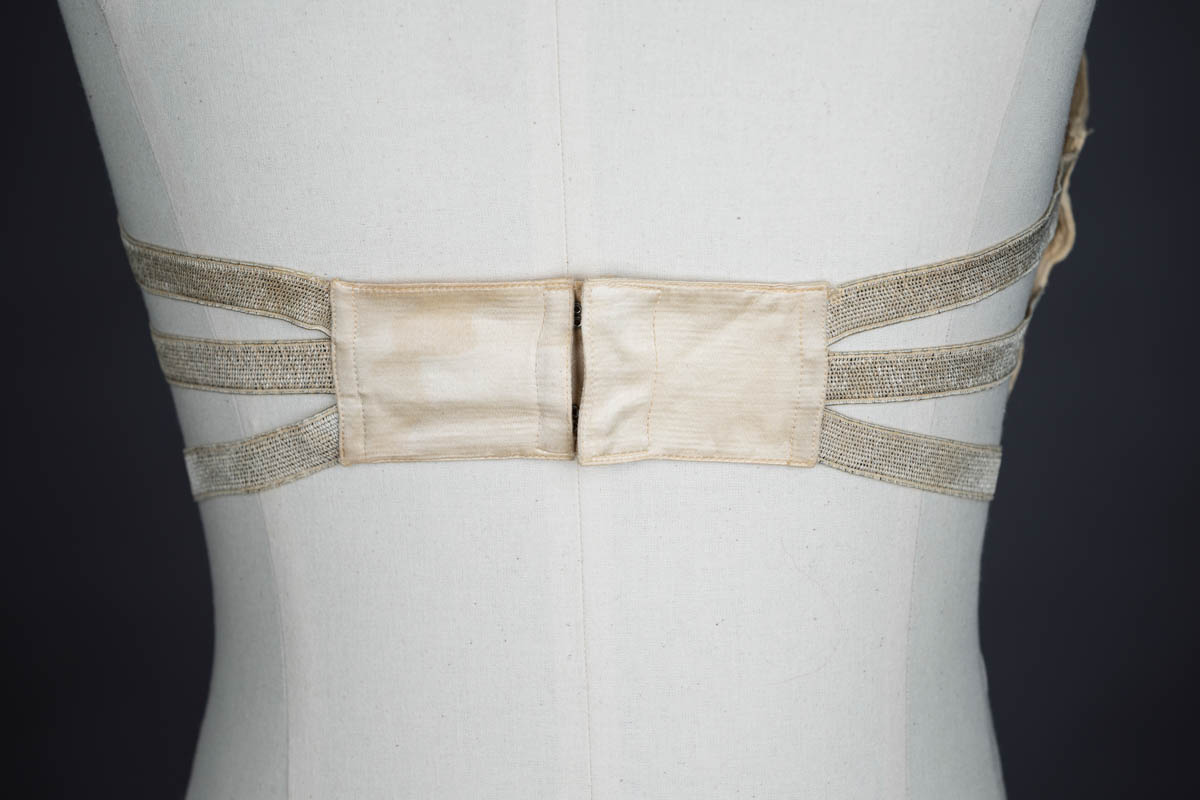 Satin bandeau bra with tripartate strapping by The Modishform, c. late 1910s The Underpinnings Museum shot by Tigz Rice Studios 2017