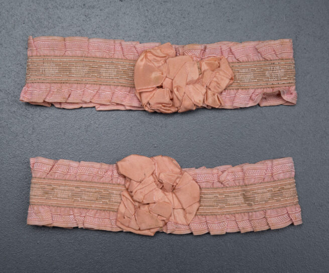 Pink ruffle elastic garters with silk rosettes, c. 1920s, USA Photography by Tigz Rice Studios. From The Underpinnings Museum Collection.
