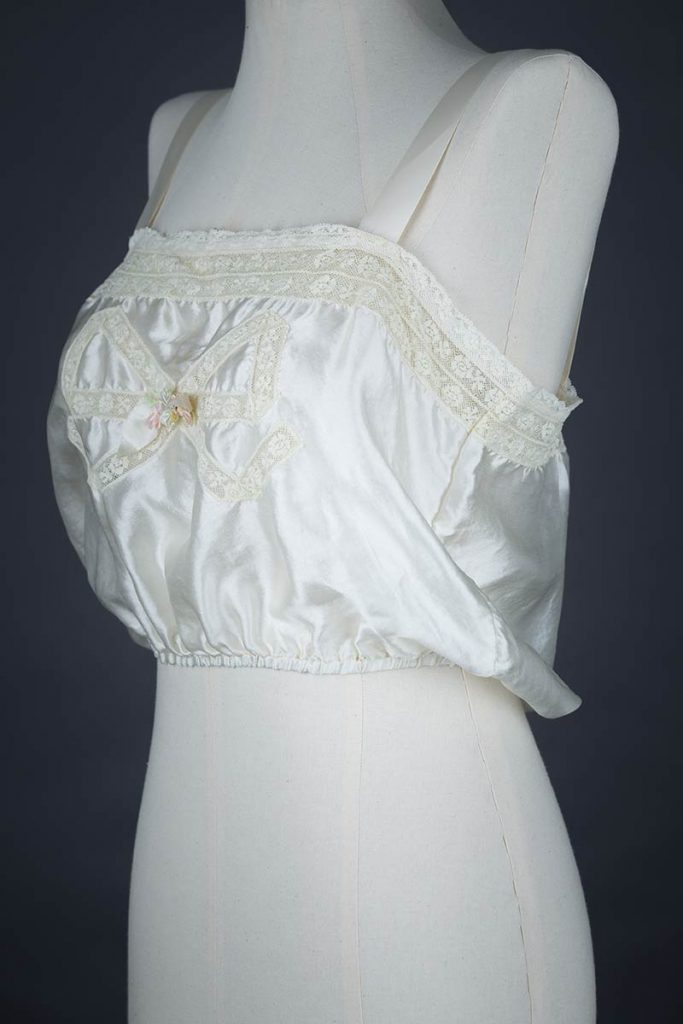 Bow Lace Insertion & Ribbonwork Silk Corset Cover, c. 1920s, USA Photography by Tigz Rice Studios. From The Underpinnings Museum collection.