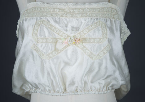 Bow Lace Insertion & Ribbonwork Silk Corset Cover, c. 1920s, USA Photography by Tigz Rice Studios. From The Underpinnings Museum collection.