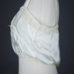 Bow Lace Insertion & Ribbonwork Silk Corset Cover, c. 1920s, USA Photography by Tigz Rice Studios. From The Underpinnings Museum collection.