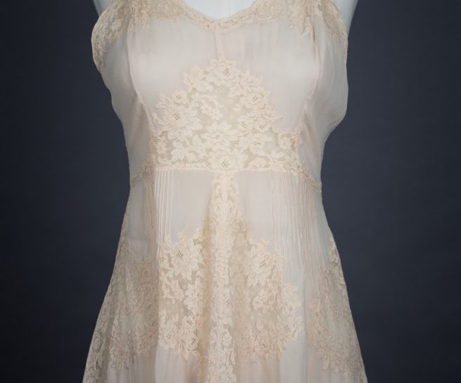 Silk & Lace Appliqué Trousseau Short Slip, c. 1930s, Great Britain Photography by Tigz Rice Studios. From The Underpinnings Museum collection.