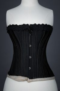 Black cotton working woman's corset, c.1900, Great Britain. The Underpinnings Museum, Photo by Tigz Rice