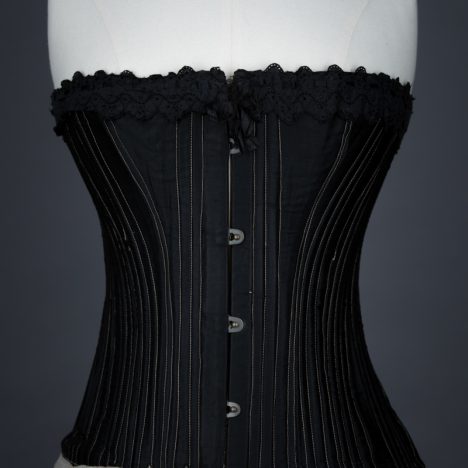 Black cotton working woman's corset, c.1900, Great Britain. The Underpinnings Museum, Photo by Tigz Rice