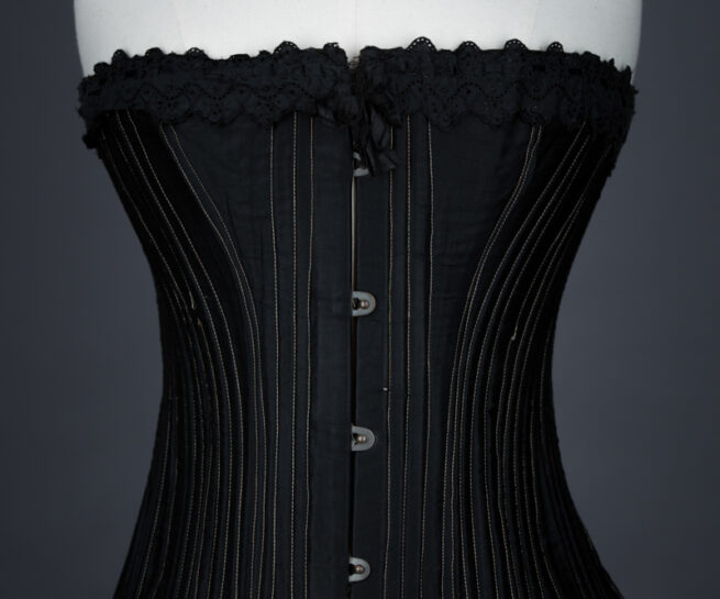 Black cotton working woman's corset, c.1900, Great Britain. The Underpinnings Museum, Photo by Tigz Rice