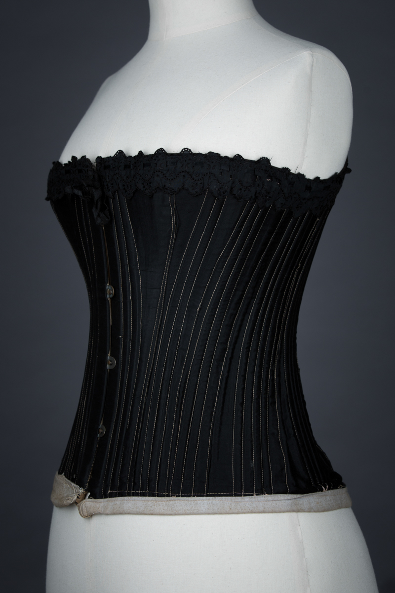 Black cotton working woman's corset, c.1900, Great Britain. The Underpinnings Museum, Photo by Tigz Rice