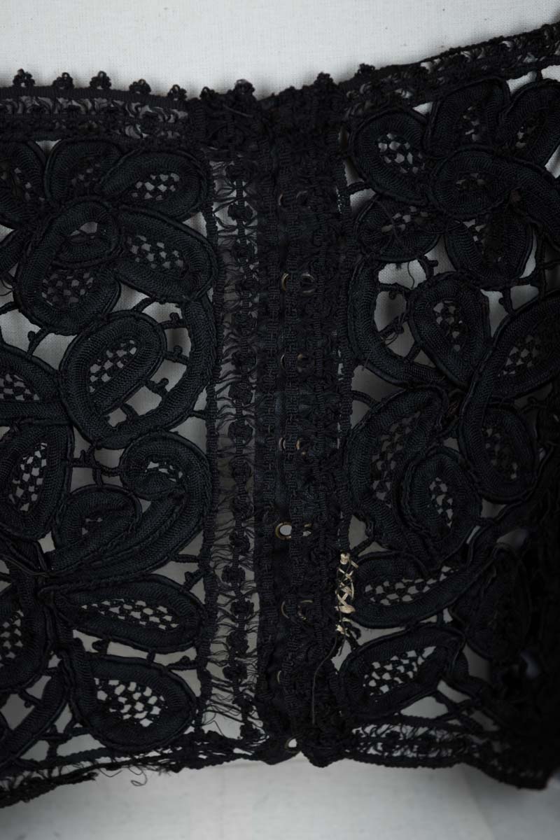 Black Lace Corset Cover, c. 1910s. The Underpinnings Museum. Photography by Tigz Rice