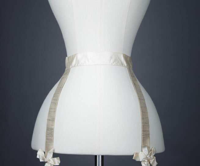 Cream Silk Hose Supporter Suspender Belt, c. 1900s. From The Underpinnings Museum collection Photography by Tigz Rice