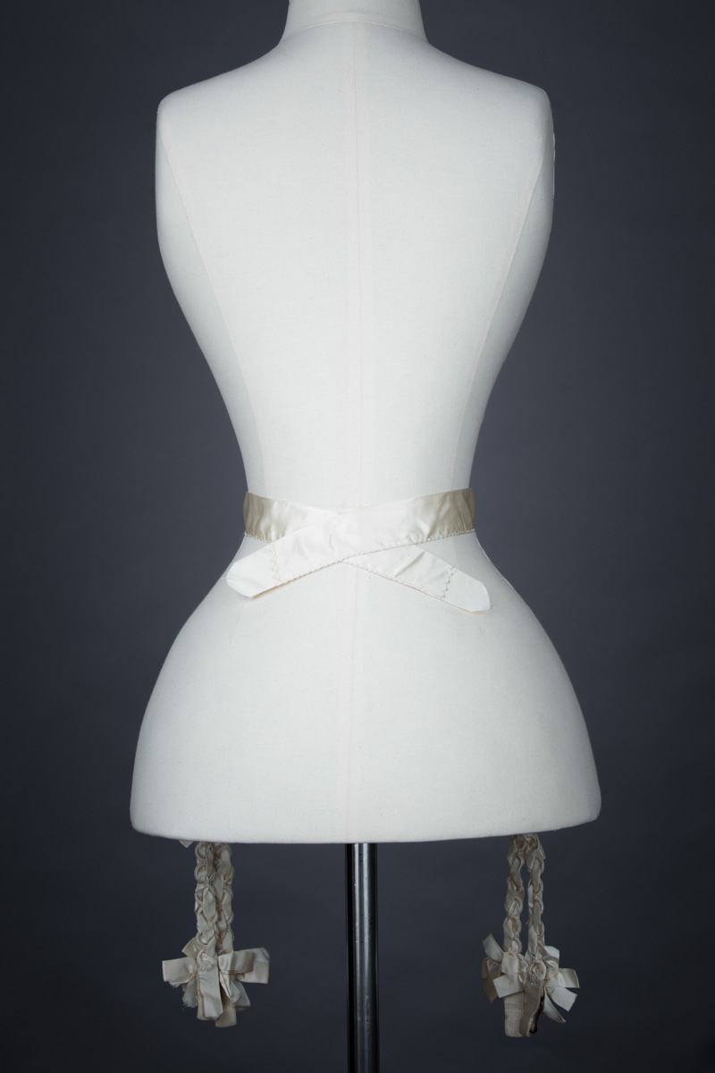 Cream Silk Hose Supporter Suspender Belt, c. 1900s. From The Underpinnings Museum collection Photography by Tigz Rice