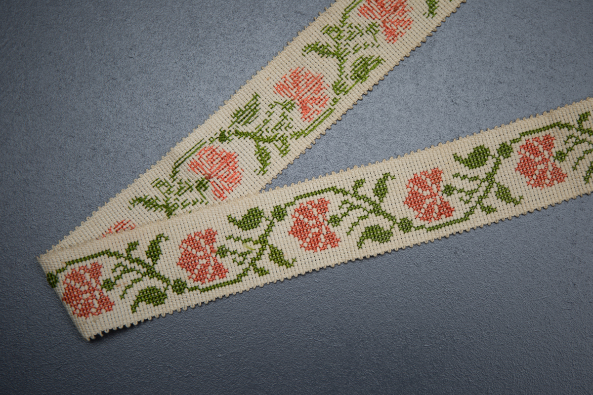 Cross stitch garter with ribbon tie, c. 1820s. From The Underpinnings Museum collection Photography by Tigz Rice