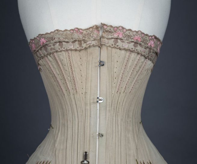 'Droit Devant Forme Nouvelle' Drab Coutil Corset With Flossing Embroidery, c, 1900-5, France. The Underpinnings Museum. Photography by Tigz Rice