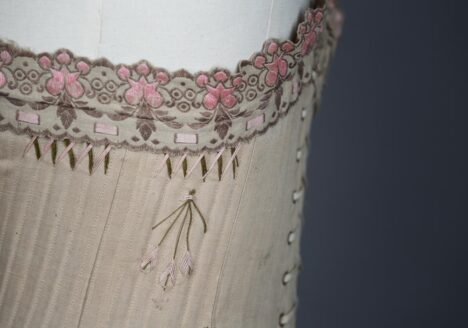 'Droit Devant Forme Nouvelle' Drab Coutil Corset With Flossing Embroidery, c, 1900-5, France. The Underpinnings Museum. Photography by Tigz Rice