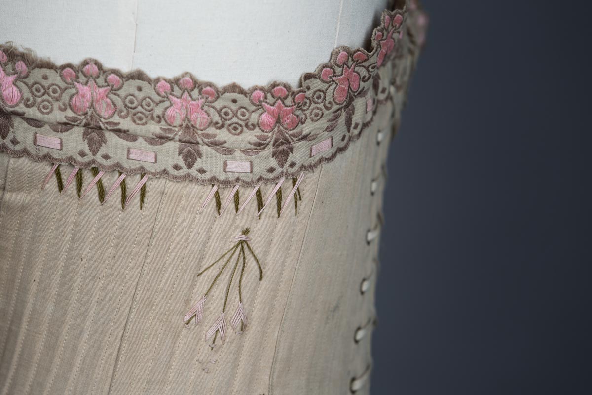 'Droit Devant Forme Nouvelle' Drab Coutil Corset With Flossing Embroidery, c, 1900-5, France. The Underpinnings Museum. Photography by Tigz Rice