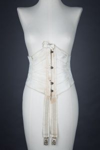 Overlocked Floral Jacquard Weave Ribbon Corset, c. 1900, Great Britain. The Underpinnings Museum. Photo by Tigz Rice