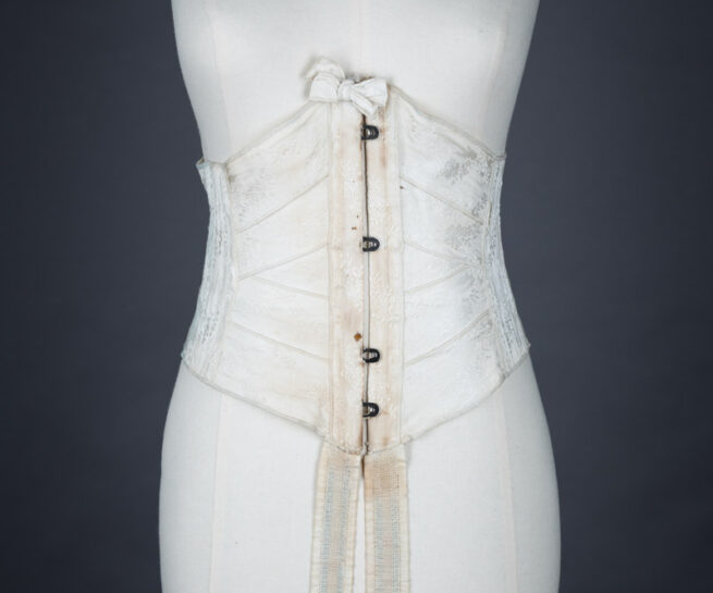 Overlocked Floral Jacquard Weave Ribbon Corset, c. 1900, Great Britain. The Underpinnings Museum. Photo by Tigz Rice
