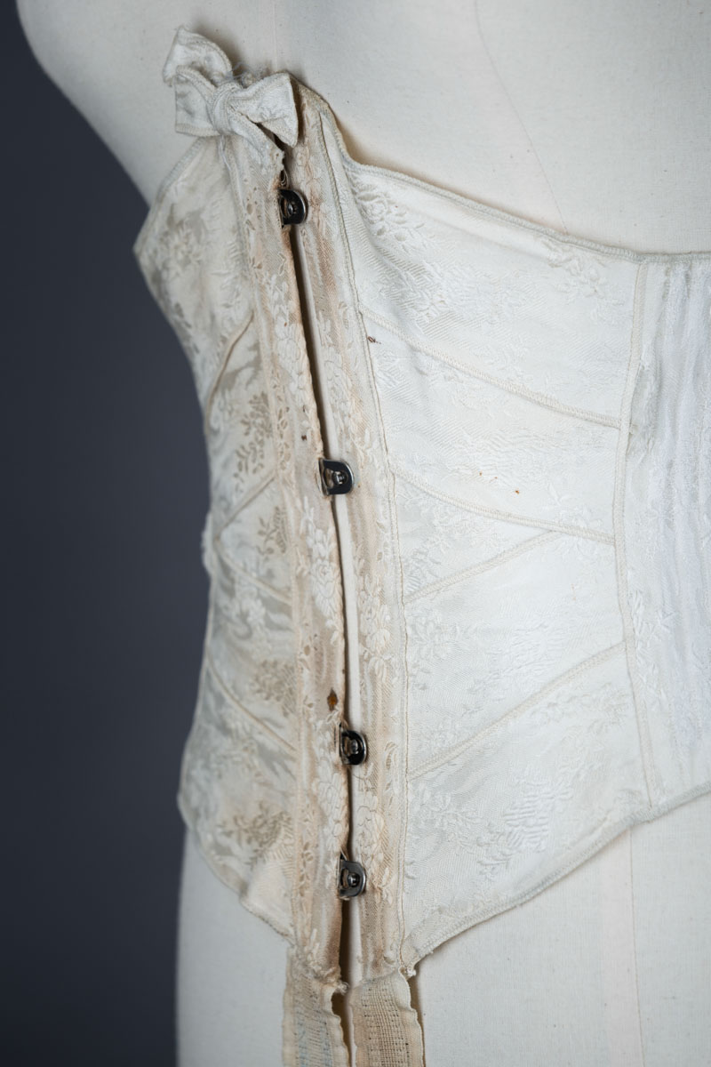 Overlocked Floral Jacquard Weave Ribbon Corset, c. 1900, Great Britain. The Underpinnings Museum. Photo by Tigz Rice