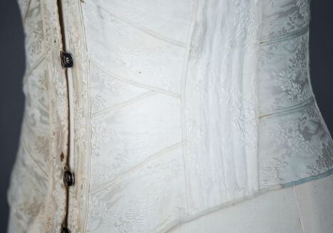 Overlocked Floral Jacquard Weave Ribbon Corset, c. 1900, Great Britain. The Underpinnings Museum. Photo by Tigz Rice