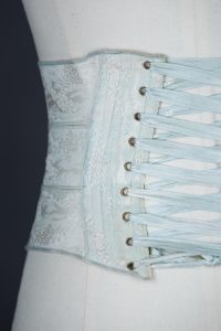 Overlocked Floral Jacquard Weave Ribbon Corset, c. 1900, Great Britain. The Underpinnings Museum. Photo by Tigz Rice