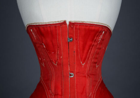 Red midbust corset with flossing and gores, c.1860s From The Underpinning Museum collection Photography by Tigz Rice