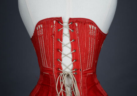 Red midbust corset with flossing and gores, c.1860s From The Underpinning Museum collection Photography by Tigz Rice