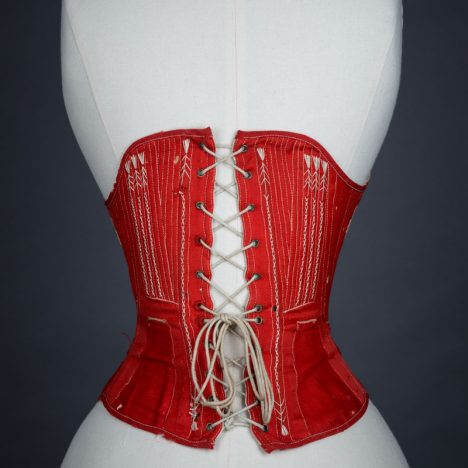 Red midbust corset with flossing and gores, c.1860s From The Underpinning Museum collection Photography by Tigz Rice