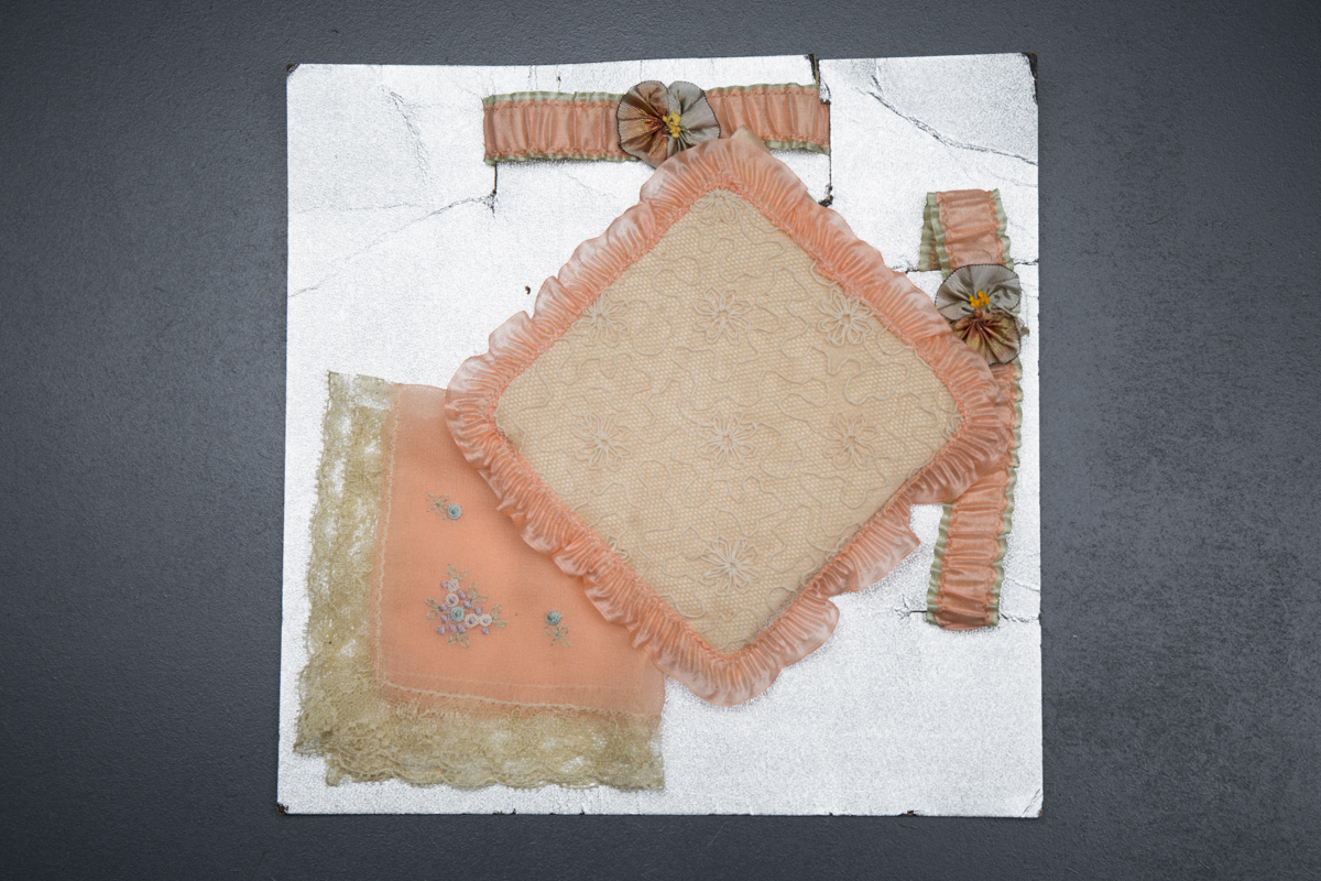 Silk Ribbon Garter & Embroidered Handkerchief Gift Set, c. 1920s, USA. The Underpinnings Museum. Photo by Tigz Rice
