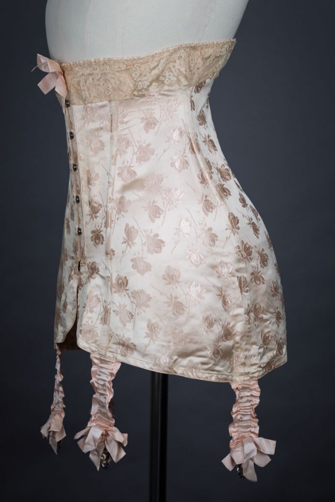 Floral silk wedding corset by Lafayette, c. 1910s, France. The Underpinnings Museum. Photo by Tigz Rice