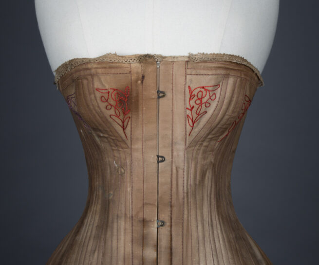 Brown cotton corset with embroidered bust gores, c. 1890s, USA From The Underpinnings Museum collection Photography by Tigz Rice