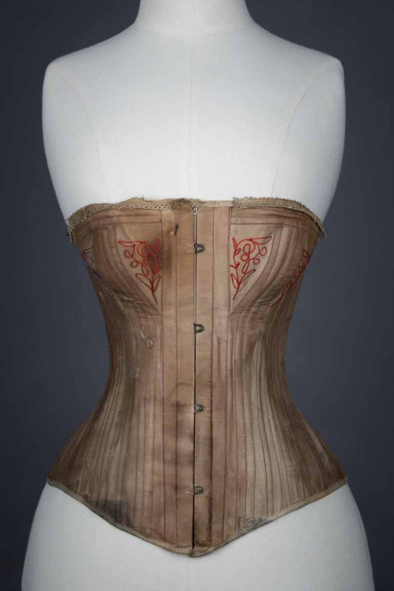 Brown cotton corset with embroidered bust gores, c. 1890s, USA From The Underpinnings Museum collection Photography by Tigz Rice
