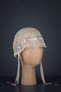 Chemical lace boudoir cap with ribbonwork, c. 1920s, GB, The Underpinnings Museum. Photo by Tigz Rice