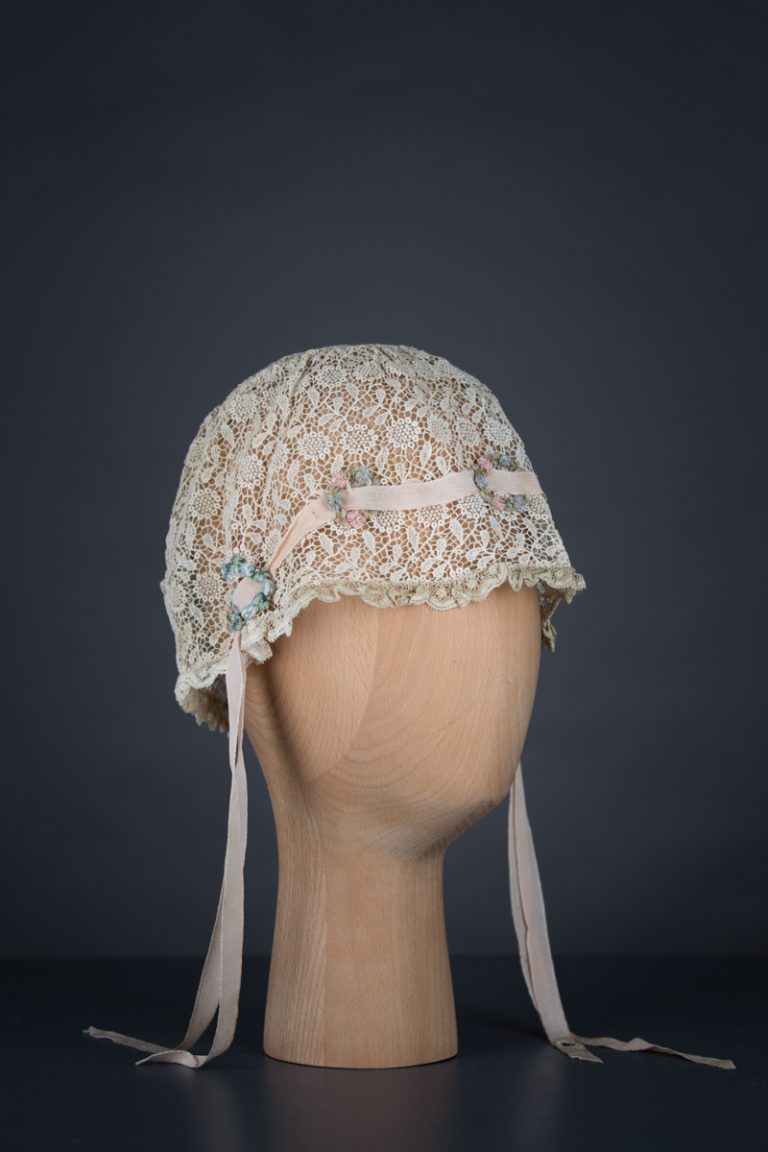 Chemical lace boudoir cap with ribbonwork, c. 1920s, GB, The Underpinnings Museum. Photo by Tigz Rice