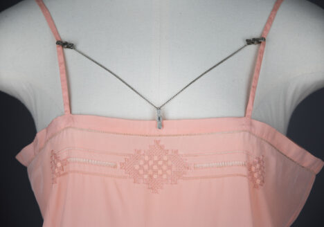 Engraved lingerie clips, c. 1920s. The Underpinnings Museum. Photo by Tigz Rice