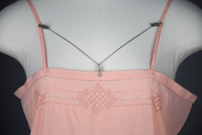 Engraved lingerie clips, c. 1920s. The Underpinnings Museum. Photo by Tigz Rice