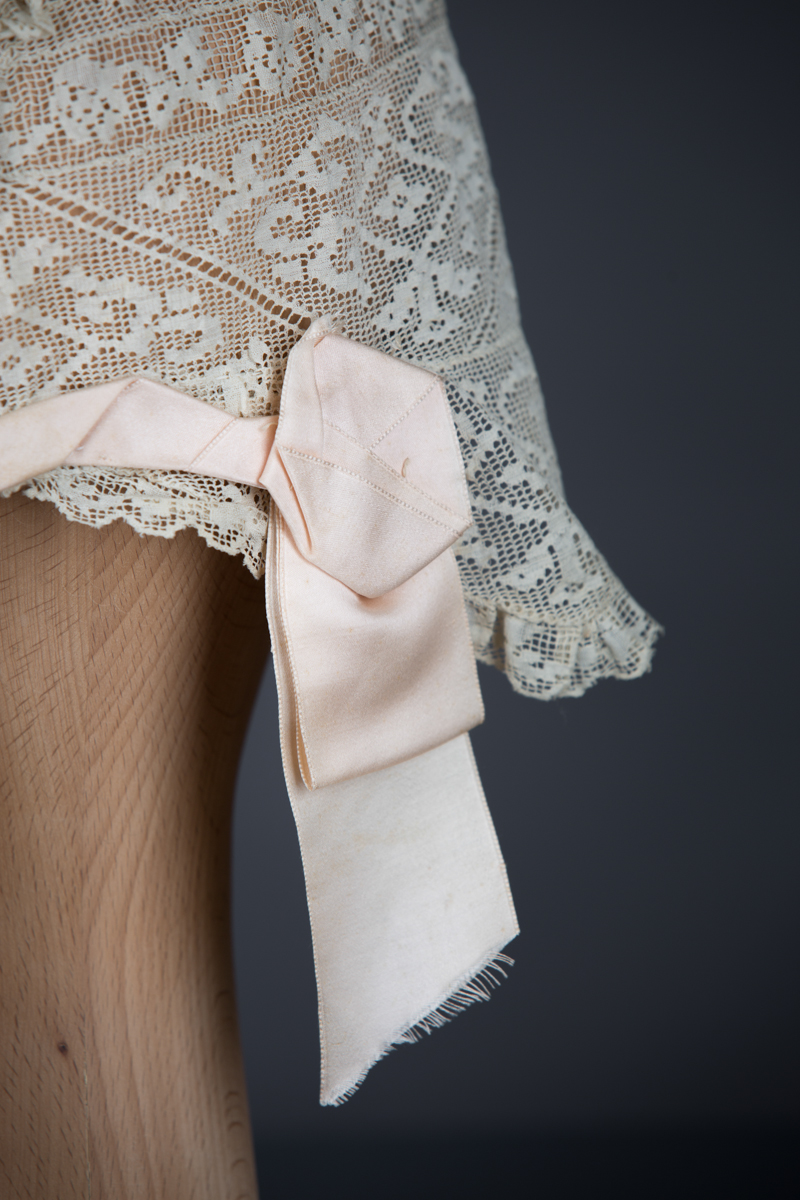 Filet lace boudoir cap, c. 1910s, GB. The Underpinnings Museum. Photo by Tigz Rice