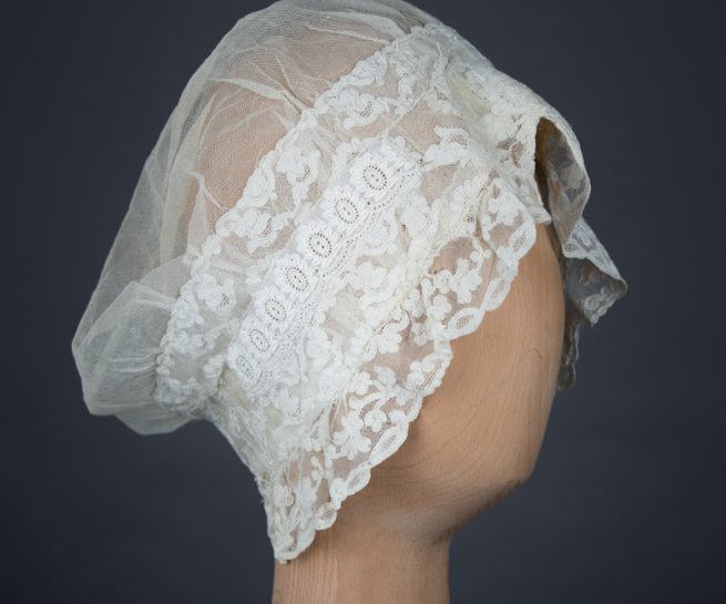 Ivory Tulle & Lace Boudoir Cap c. 1890s, Great Britain. The Underpinnings Museum, photography by Tigz Rice