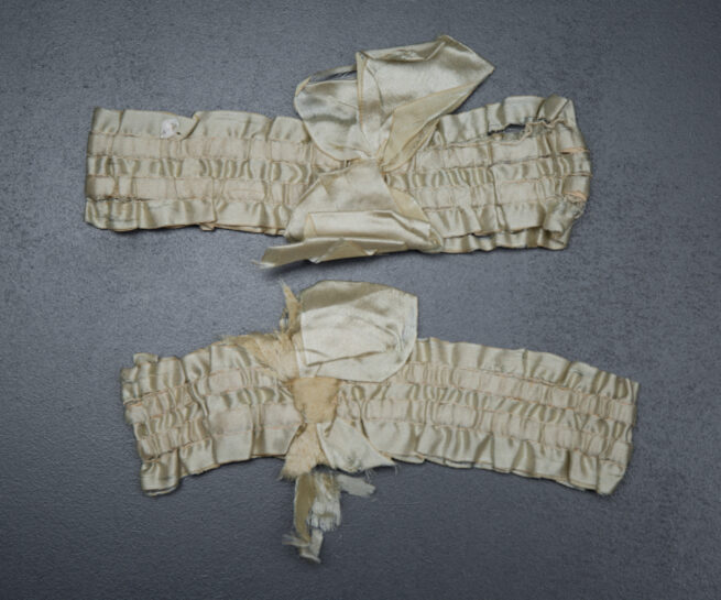 Ivory silk ribbon garters, c. 1920s, USA, The Underpinnings Museum, Photo by Tigz Rice