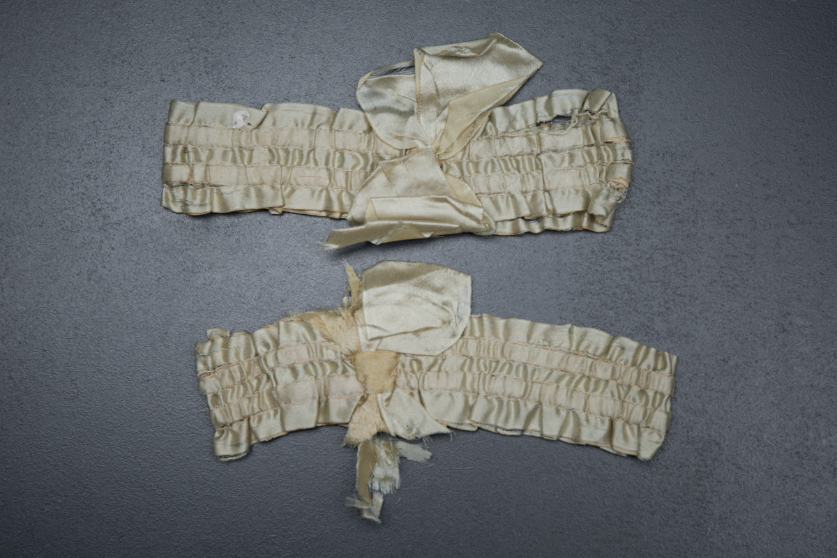 Ivory silk ribbon garters, c. 1920s, USA, The Underpinnings Museum, Photo by Tigz Rice