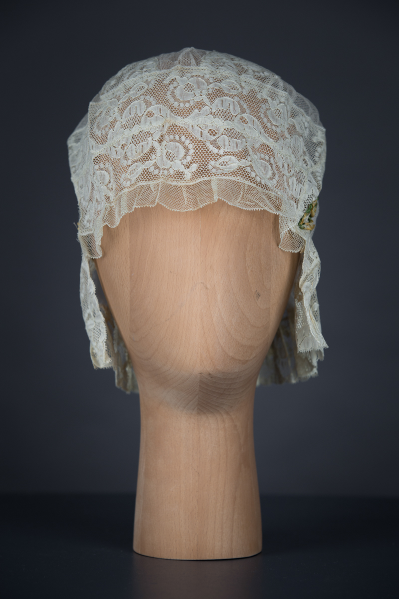 Lace, tulle and silk bow boudoir cap, c. 1910s, Au Bon Marché, France. The Underpinnings Museum, Photo by Tigz Rice
