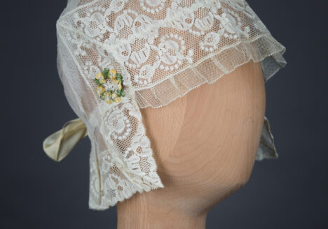 Lace, tulle and silk bow boudoir cap, c. 1910s, Au Bon Marché, France. The Underpinnings Museum, Photo by Tigz Rice