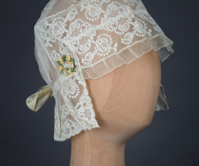 Lace, tulle and silk bow boudoir cap, c. 1910s, Au Bon Marché, France. The Underpinnings Museum, Photo by Tigz Rice