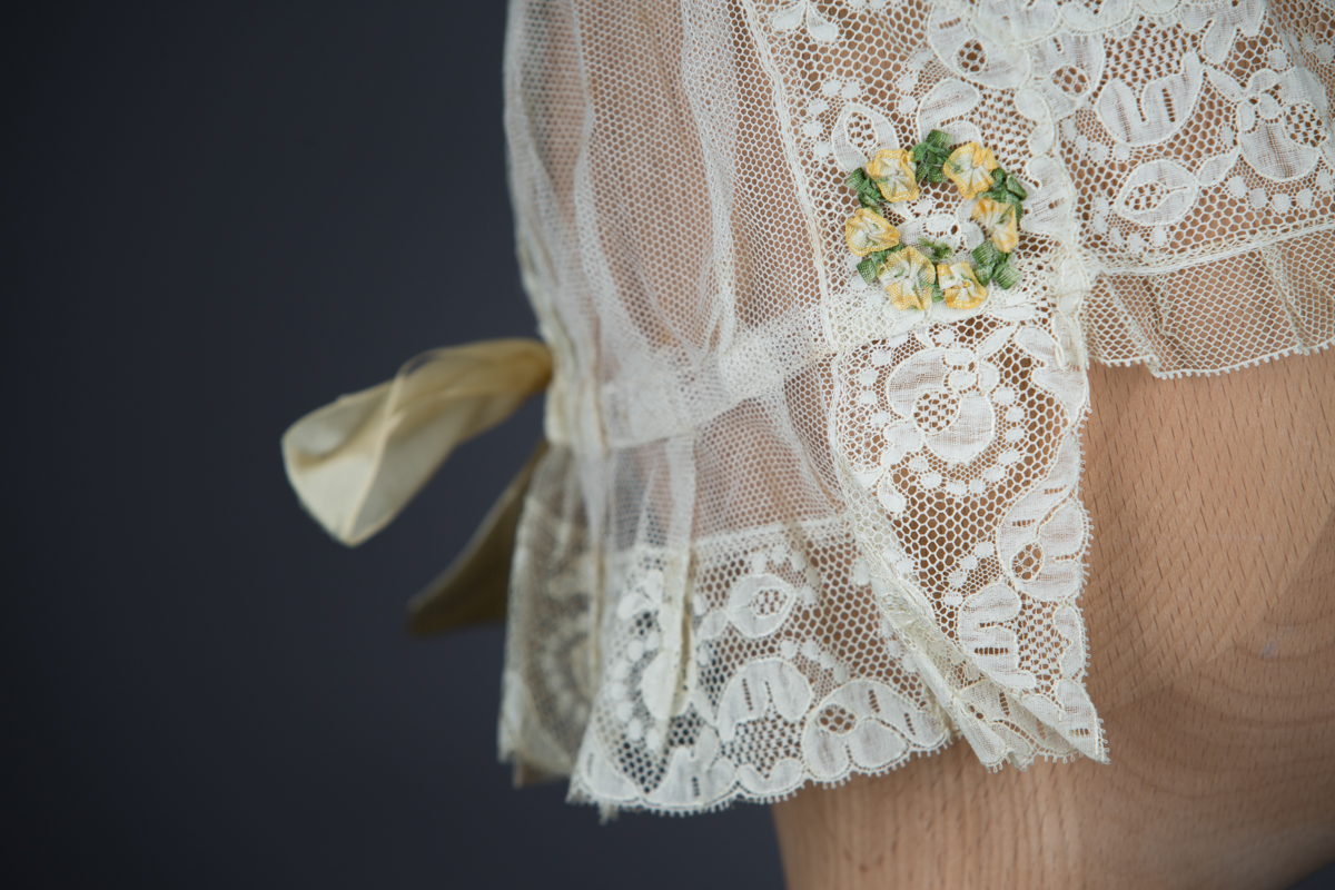 Lace, tulle and silk bow boudoir cap, c. 1910s, Au Bon Marché, France. The Underpinnings Museum, Photo by Tigz Rice