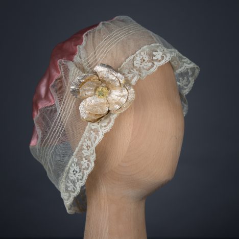 Tulle & silk boudoir cap with oversized flowers, c. 1920s, USA. The Underpinnings Museum. Photo by Tigz Rice