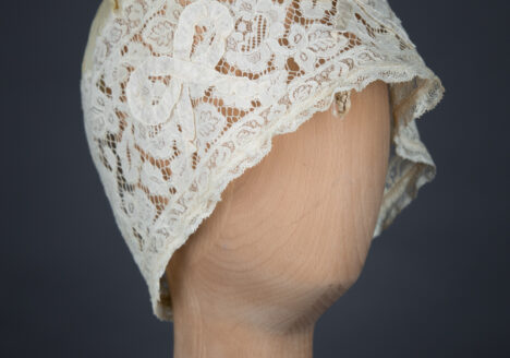 Yellow Silk, Lace & Ribbonwork Bow Appliqué Boudoir Cap, c. 1910s, Great Britain. The Underpinnings Museum. Photo by Tigz Rice