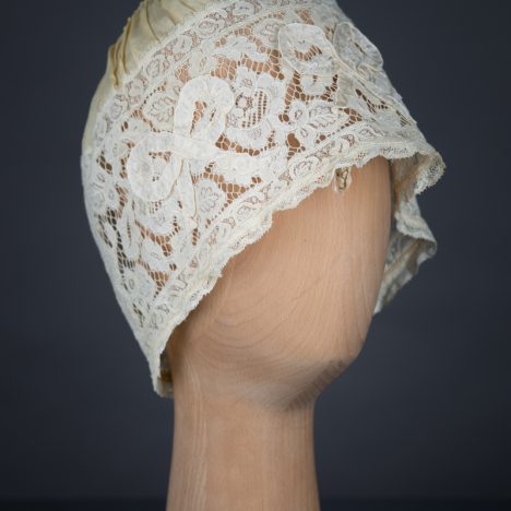 Yellow Silk, Lace & Ribbonwork Bow Appliqué Boudoir Cap, c. 1910s, Great Britain. The Underpinnings Museum. Photo by Tigz Rice