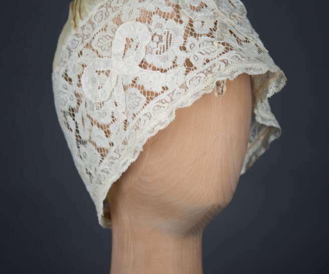 Yellow Silk, Lace & Ribbonwork Bow Appliqué Boudoir Cap, c. 1910s, Great Britain. The Underpinnings Museum. Photo by Tigz Rice