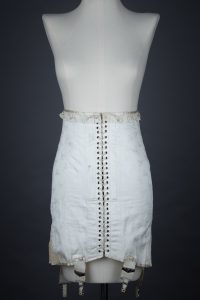 Front Lacing Brocade Girdle With Elastic Gussets & Ribbonwork, c. 1920s, Spain. The Underpinnings Museum. Photography by Tigz Rice