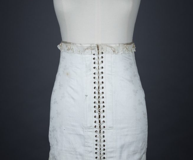 Front Lacing Brocade Girdle With Elastic Gussets & Ribbonwork, c. 1920s, Spain. The Underpinnings Museum. Photography by Tigz Rice